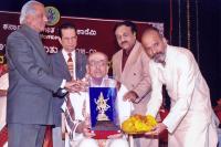 Receiving Gaurava  Prashasti from Karnataka Sangeetha Nrutya Academi -2005